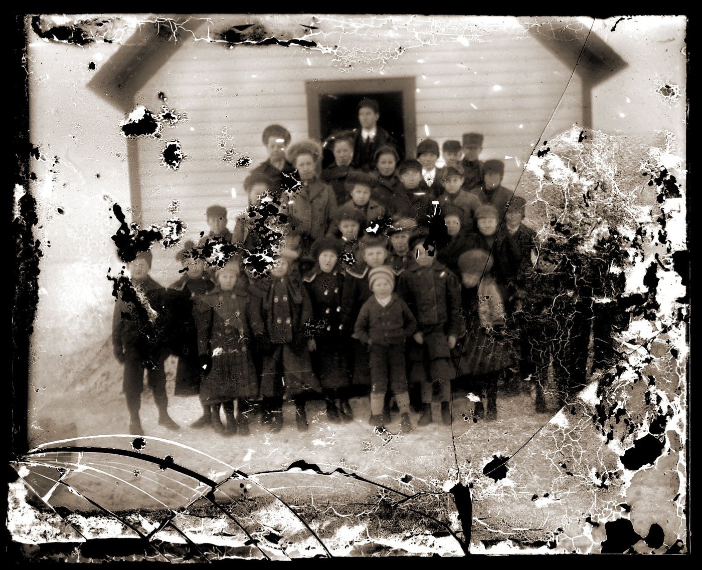 A scan of a school group photograph with large areas of the picture layer destroyed