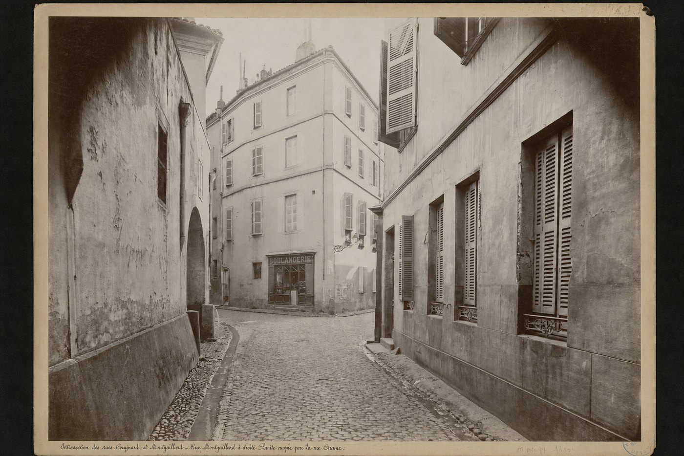 The same street with the split closed and the lettering still legible