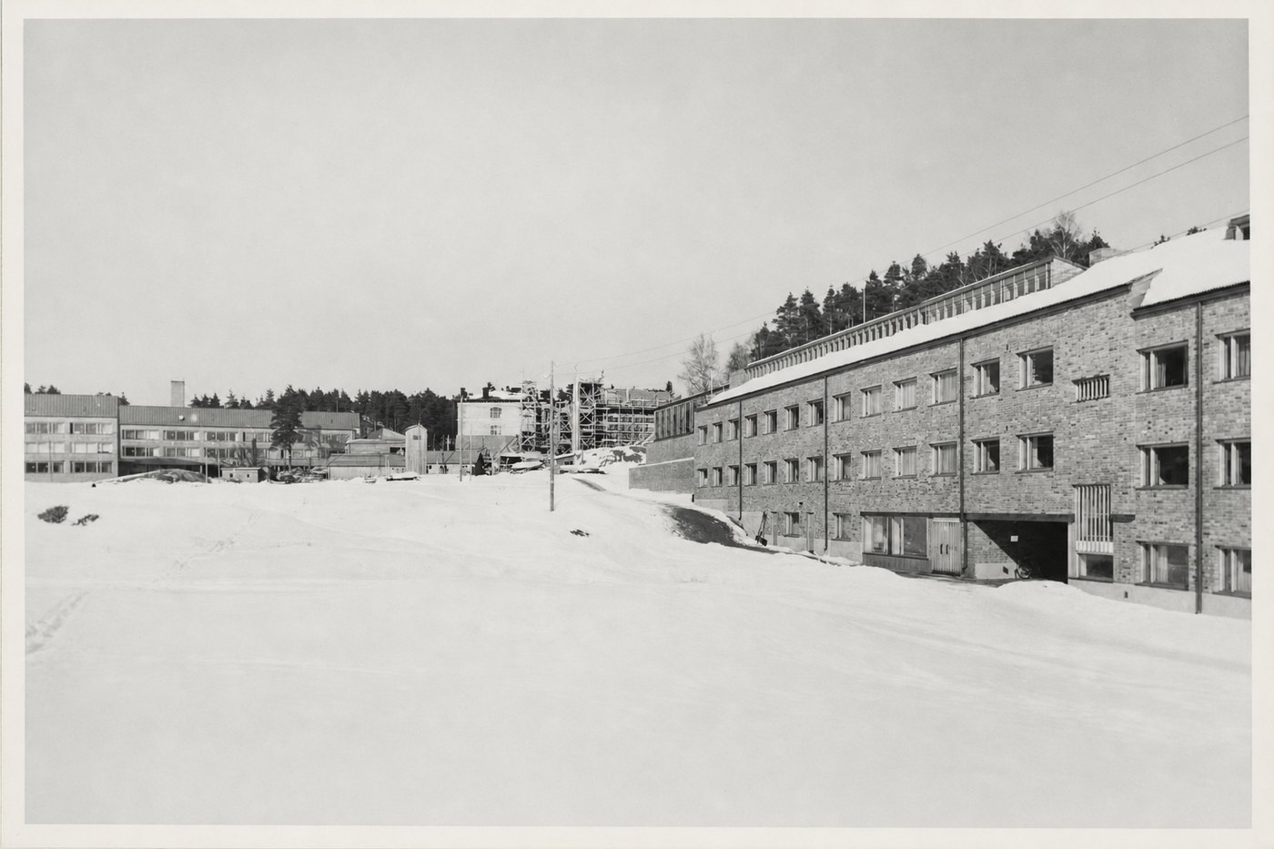 The same photograph with the stains lifted and the snow and sky running clean through where they were